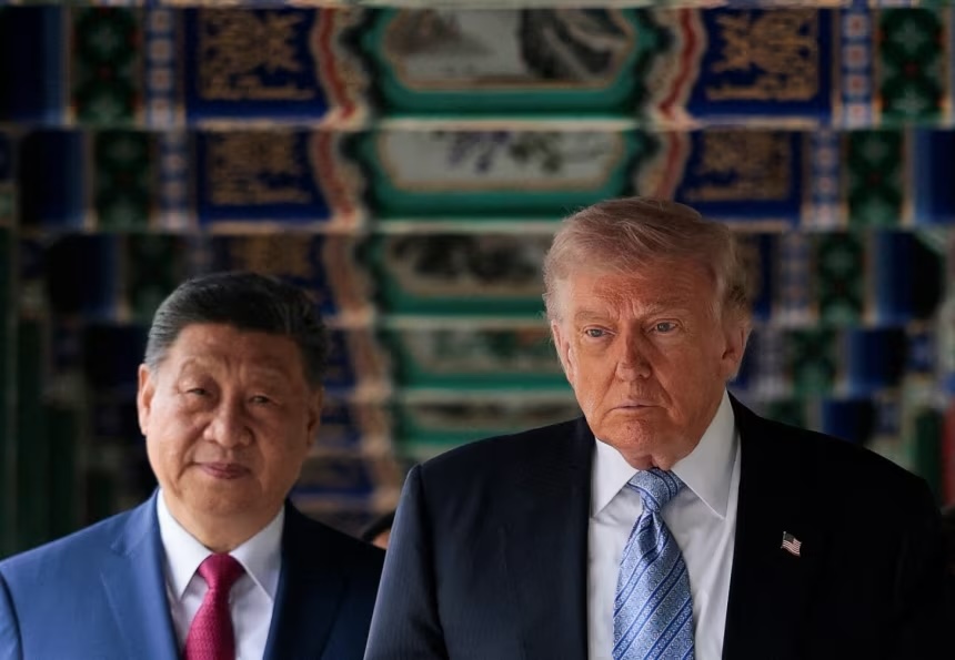 US President Donald Trump walks through Zhongnanhai Garden with Chinese leader Xi Jinping in Beijing, China, on May 15.