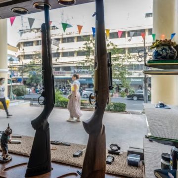 Rifles are seen inside a firearm shop in Bangkok, Thailand.